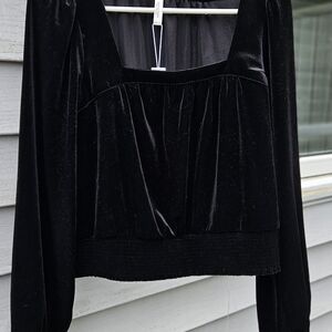 Shimmering black velvet evening top. Large